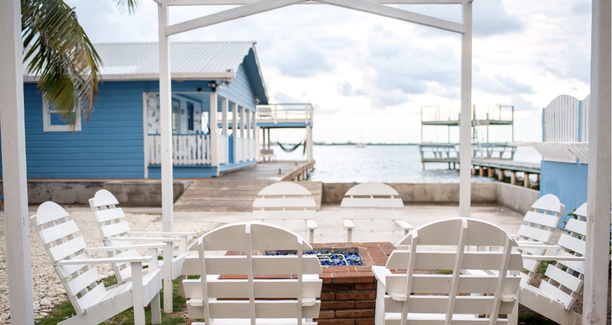Relax around the fire pit after a day of scuba diving with Tank'd Pro Dive Center Utila, Honduras